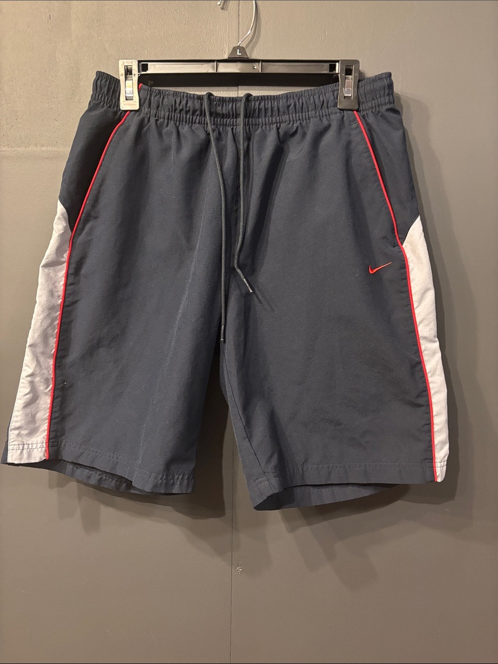 Nike Navy Athletic Shorts with White Side Panels and Red Piping